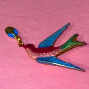 Vintage gold tone brooch with colorful bird
